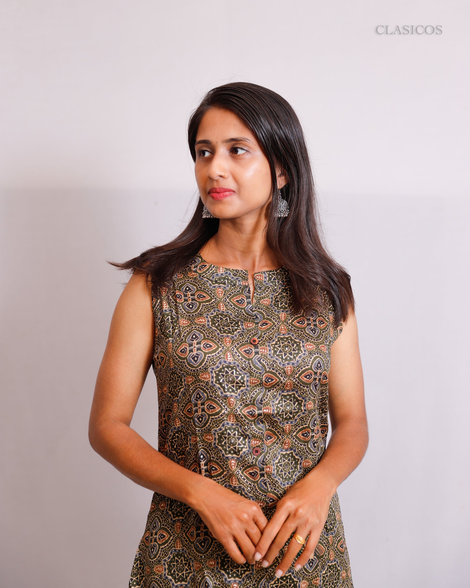 Lightweight Elegance: Muslin A-Line Sleeveless Kurti with Attached Sleeves